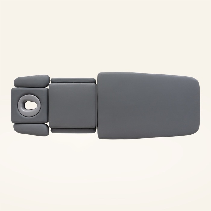 Draufsicht auf die dreiteilige Liegefläche der naggura SWOP 7 EVO mit Gesichtskissen